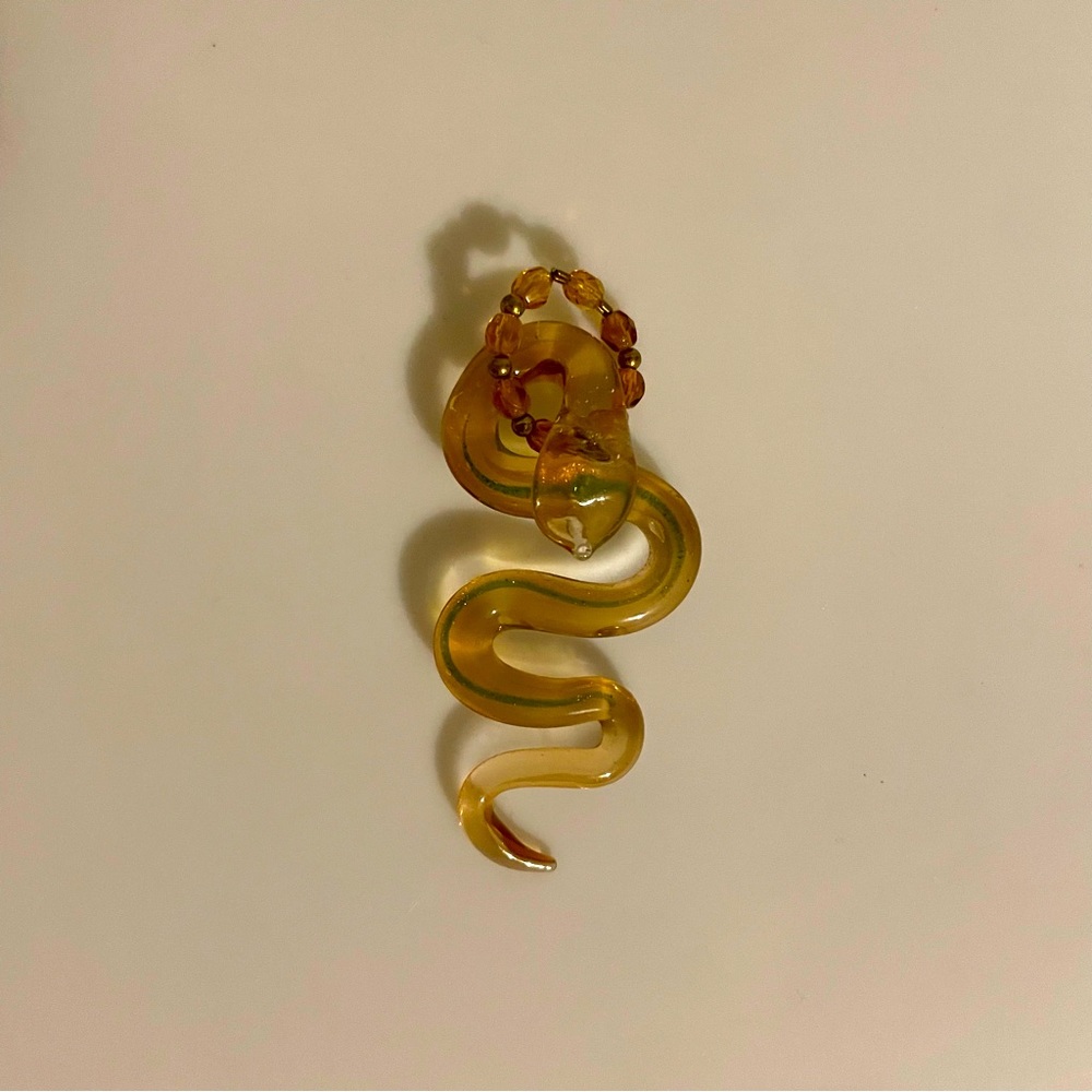 Glass snake pendant